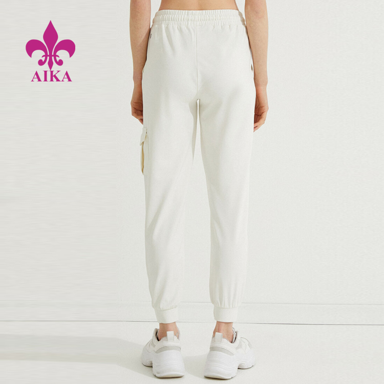 China Cheap price Tracksuits Manufacturer -
OEM Hot Sell Summer Clothes Cotton Spandex Women Drawstring Waist Cargo Pockets Sweatpants – AIKA detail pictures