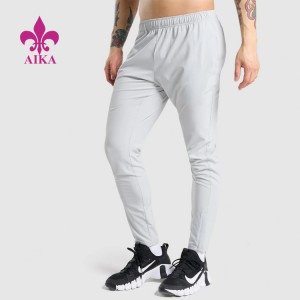 Lowest Price for Shorts For Sports Fitness -
 OEM Four Way Stretch Quick Dry ligthweight Elastic Waist Nylon Track Gym Jogger Pants For Men – AIKA