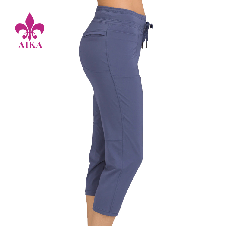 Factory directly Sports Fashion Bra -
China Custom Logo Made Sweat Pants Ladies Gym Joggers Wholesale Women Pants – AIKA detail pictures
