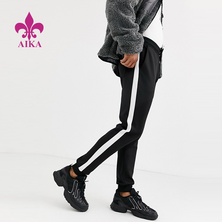 High reputation Fashion Joggers -
Custom Men Sports Running Wear Side Stripe Quick Dry Sweat Pants Skinny Joggers – AIKA detail pictures