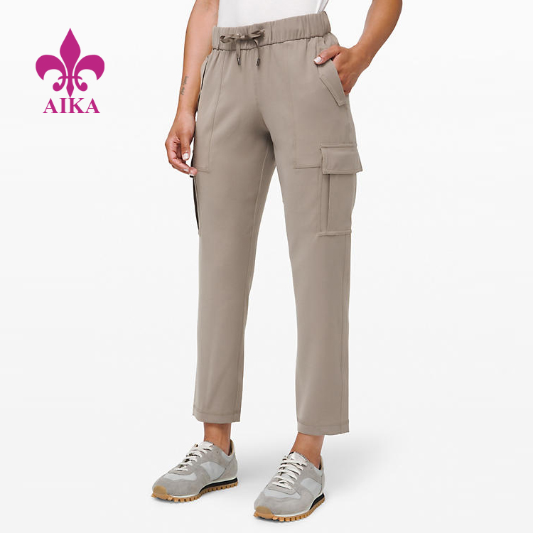 Good quality Women Sports Pants -
 Custom Sports Wear Woven Medium Rise Quick Drying Cargo Pants Women Sweat Pants – AIKA
