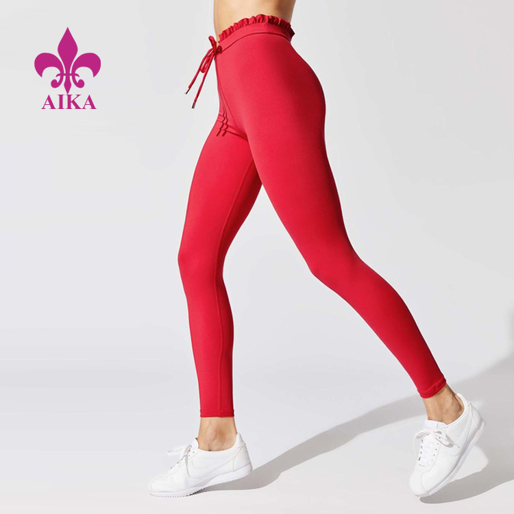 factory customized Fitness Wear Supplier -
Good price stylish and casual tights drawstring and rufflr edge yoga workout activewear leggings for women – AIKA detail pictures