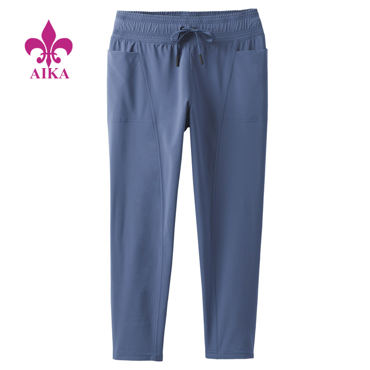 Factory directly Sports Fashion Bra -
China Custom Logo Made Sweat Pants Ladies Gym Joggers Wholesale Women Pants – AIKA detail pictures