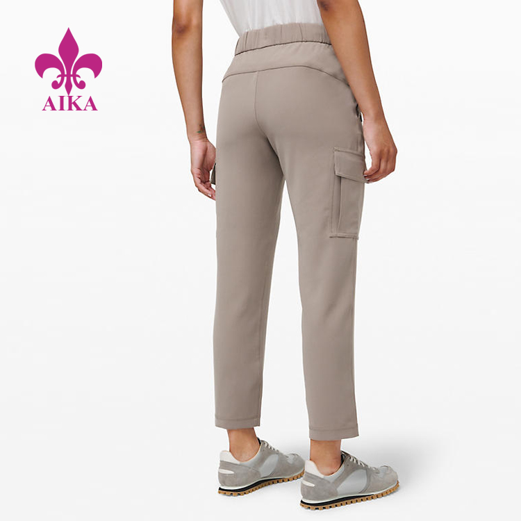 Big discounting Yoga Bra -
Custom Sports Wear Woven Medium Rise Quick Drying Cargo Pants Women Sweat Pants – AIKA detail pictures