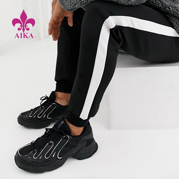 High reputation Fashion Joggers -
Custom Men Sports Running Wear Side Stripe Quick Dry Sweat Pants Skinny Joggers – AIKA detail pictures