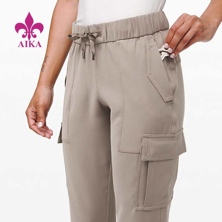 Big discounting Yoga Bra -
Custom Sports Wear Woven Medium Rise Quick Drying Cargo Pants Women Sweat Pants – AIKA detail pictures