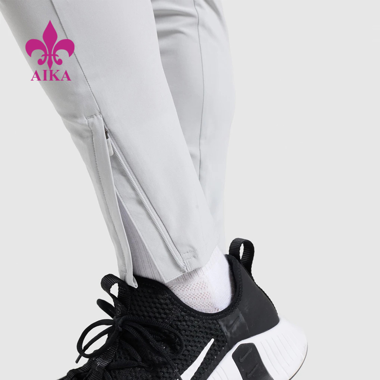 Lowest Price for Shorts For Sports Fitness -
OEM Four Way Stretch Quick Dry ligthweight Elastic Waist Nylon Track Gym Jogger Pants For Men – AIKA detail pictures