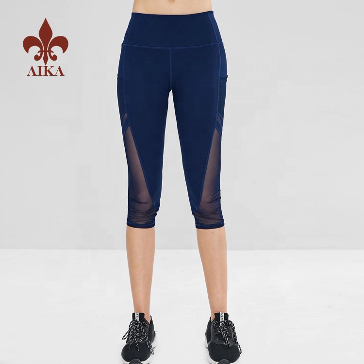 Big discounting Yoga Bra -
High quality Customized Navy yoga capris wholesale 86% nylon 14% spandex fitness sports wear for women – AIKA detail pictures