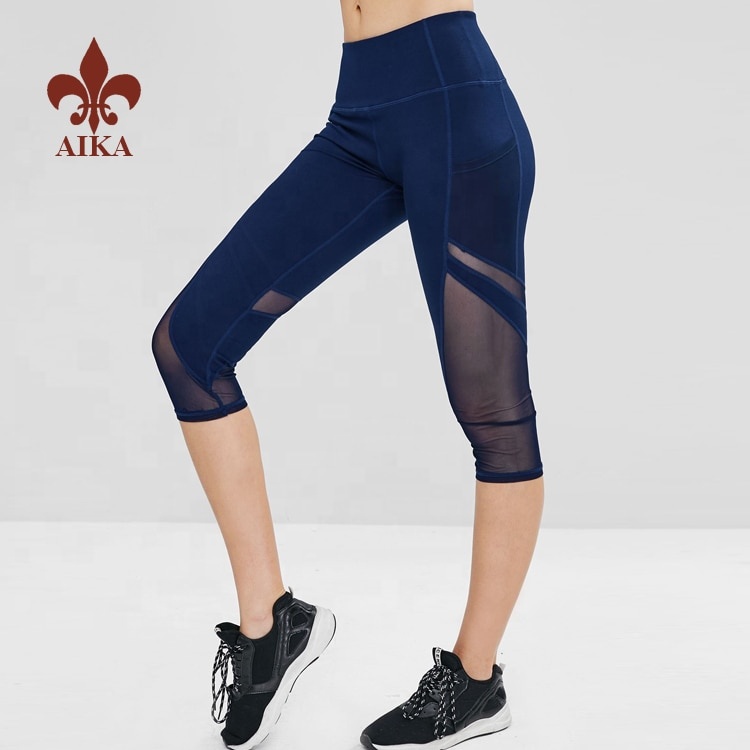 Big discounting Yoga Bra -
High quality Customized Navy yoga capris wholesale 86% nylon 14% spandex fitness sports wear for women – AIKA detail pictures