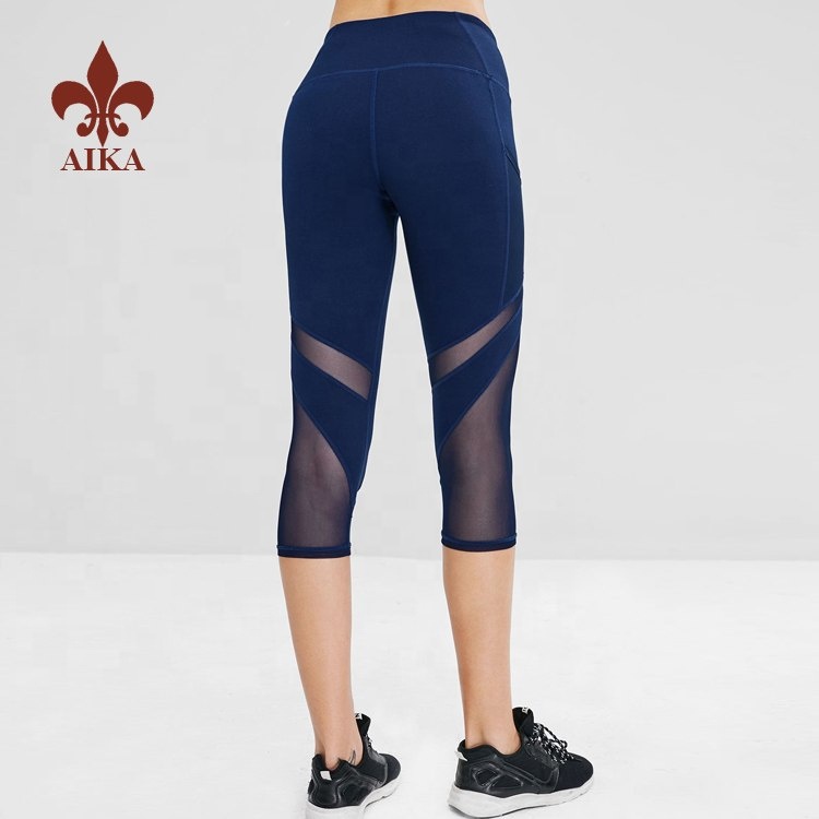 Big discounting Yoga Bra -
High quality Customized Navy yoga capris wholesale 86% nylon 14% spandex fitness sports wear for women – AIKA detail pictures