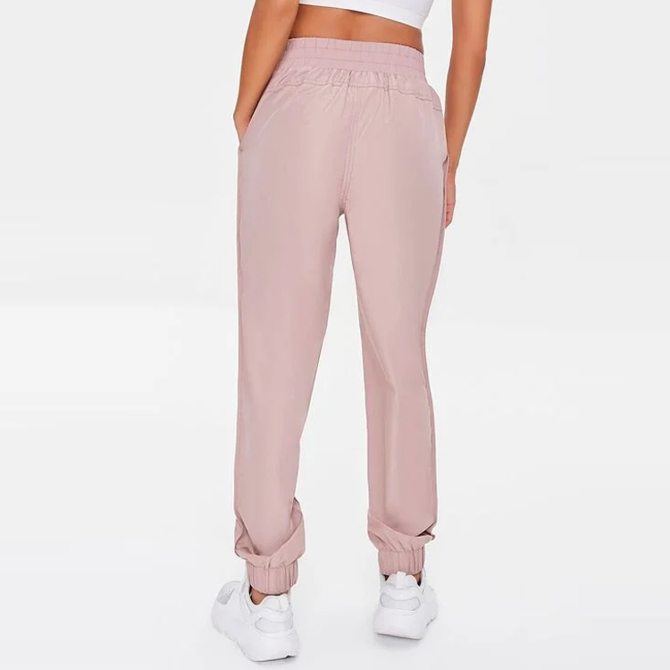 Wholesale Elastic Waist 100%Polyester Athletic Track Pants Side Pockets Gym Joggers For Women detail pictures