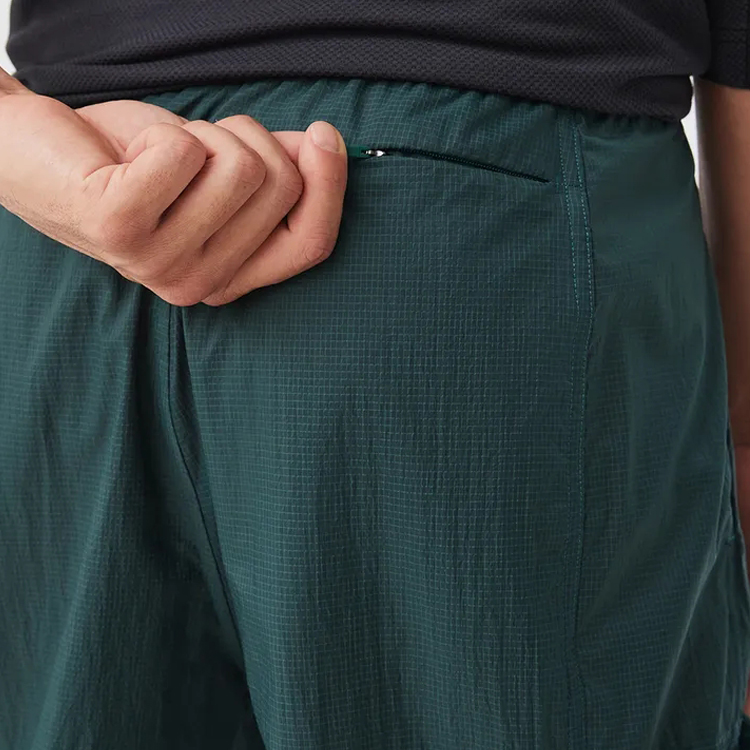 Custom Lightweight Polyester Drawstring Waist Windbreaker Jogger Sports Pants For Men detail pictures