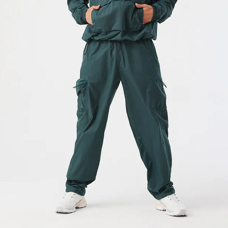 Custom Lightweight Polyester Drawstring Waist Windbreaker Jogger Sports Pants For Men detail pictures