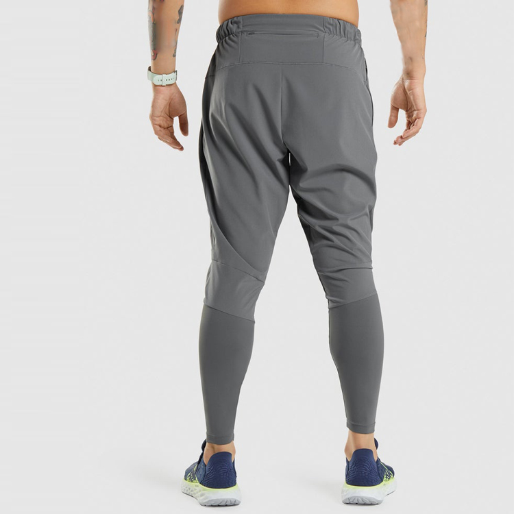 Quick Dry Polyester Sports Pants Waist Pocket Custom Slim Fit Jogger Pants For Men detail pictures